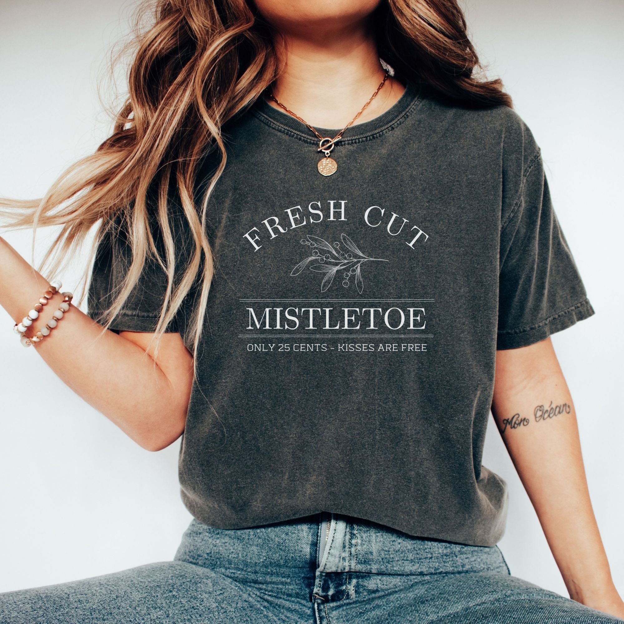 Nostalgic dark grey tshirt reading Fresh Cut Mistletoe Only 25 cents kisses are free